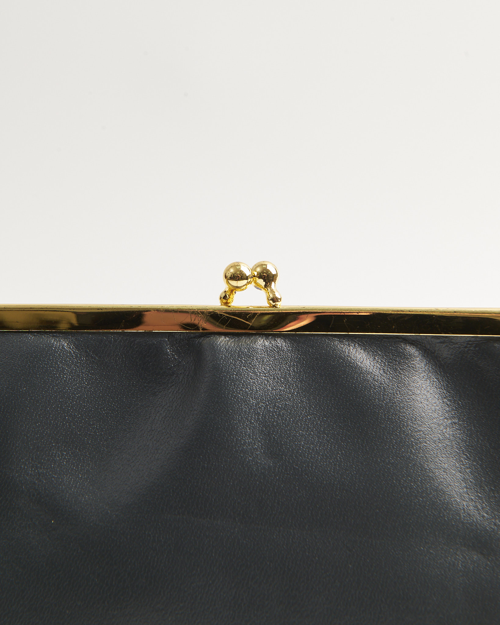 Миниатюрная сумка-клатч из кожи — фото 2